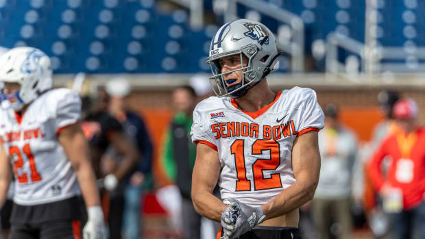 Feb 1, 2024; Mobile, AL, USA; National wide receiver Luke McCaffrey of Rice (12) walks up tot he line during practice for the National team at Hancock Whitney Stadium. Mandatory Credit: Vasha Hunt-USA TODAY Sports 